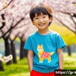 키즈용 티셔츠 추천 - A cheerful Japanese child wearing a colorful organic cotton T-shirt with bright red, blue, and yello...
